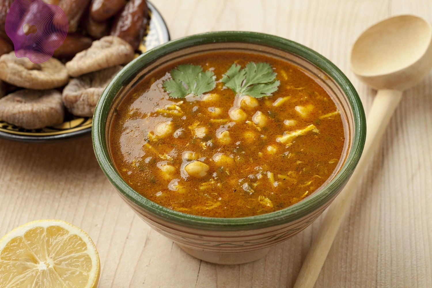 Traditional Moroccan harira soup served with dates, a classic part of Marrakech street food.